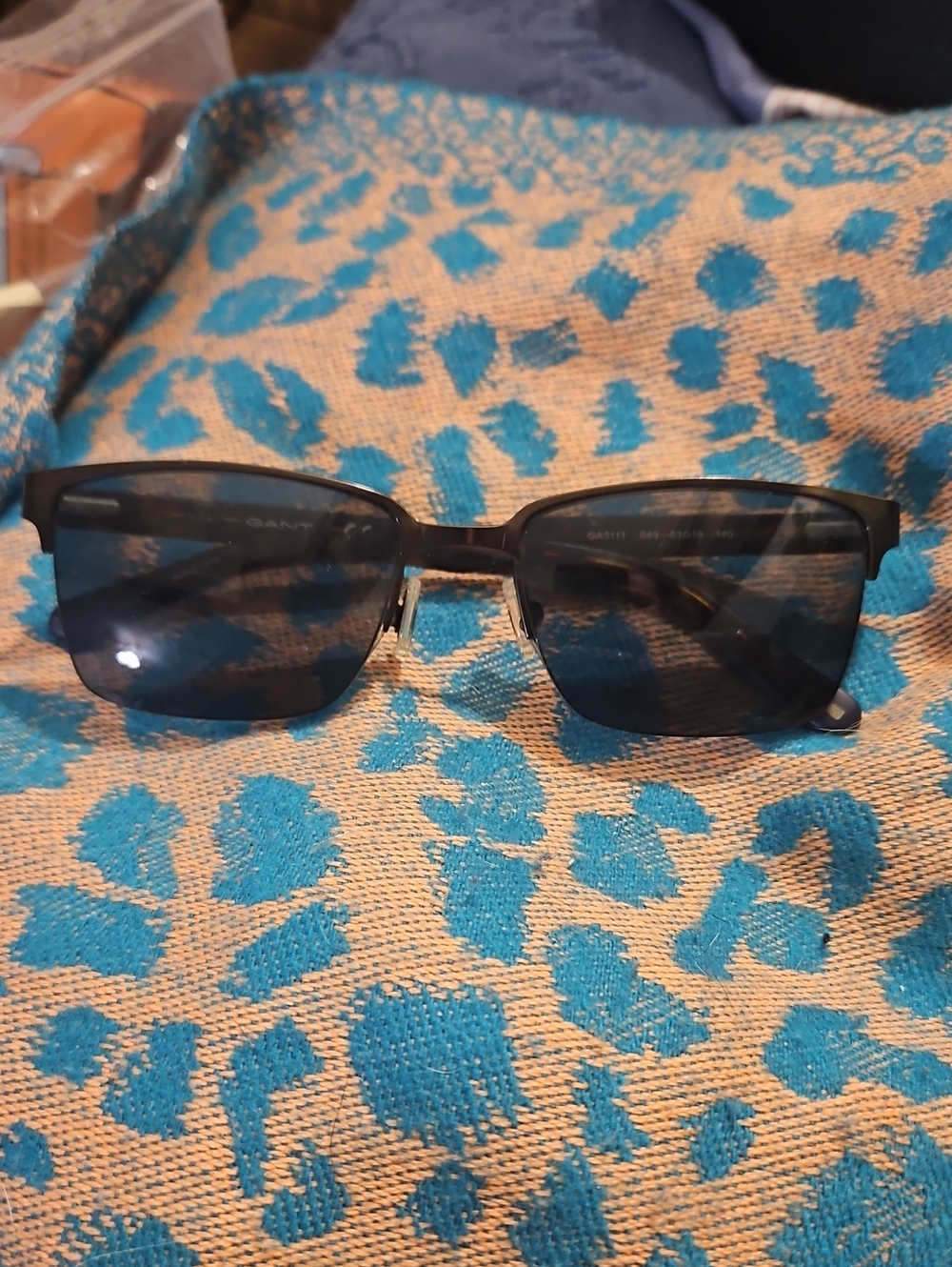 Gant Black Frame Sunglasses with Dark Blue Lenses